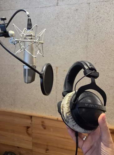 Recording vocals at GuitarRec Studio.
